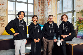 Vier Teammitglieder